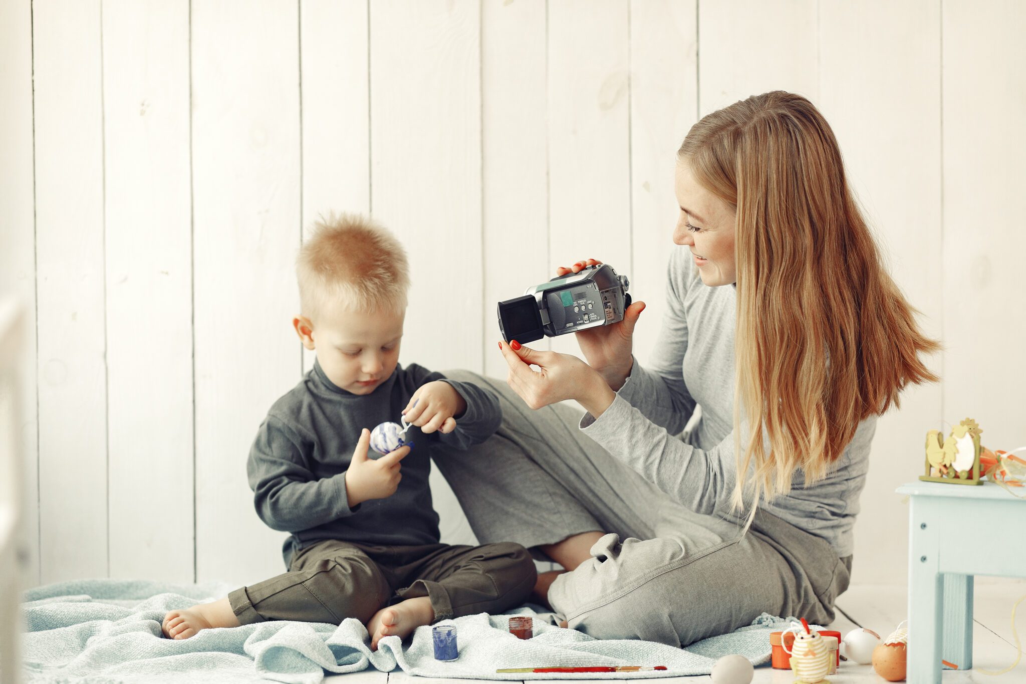 Mother with son at home prepare to easter
